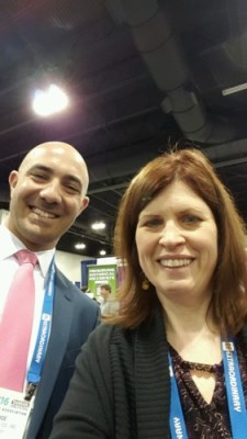 Prize-winner Marianne Malagon takes a selfie with Tim Hooge in the William S. Hein & Co., Inc. booth.